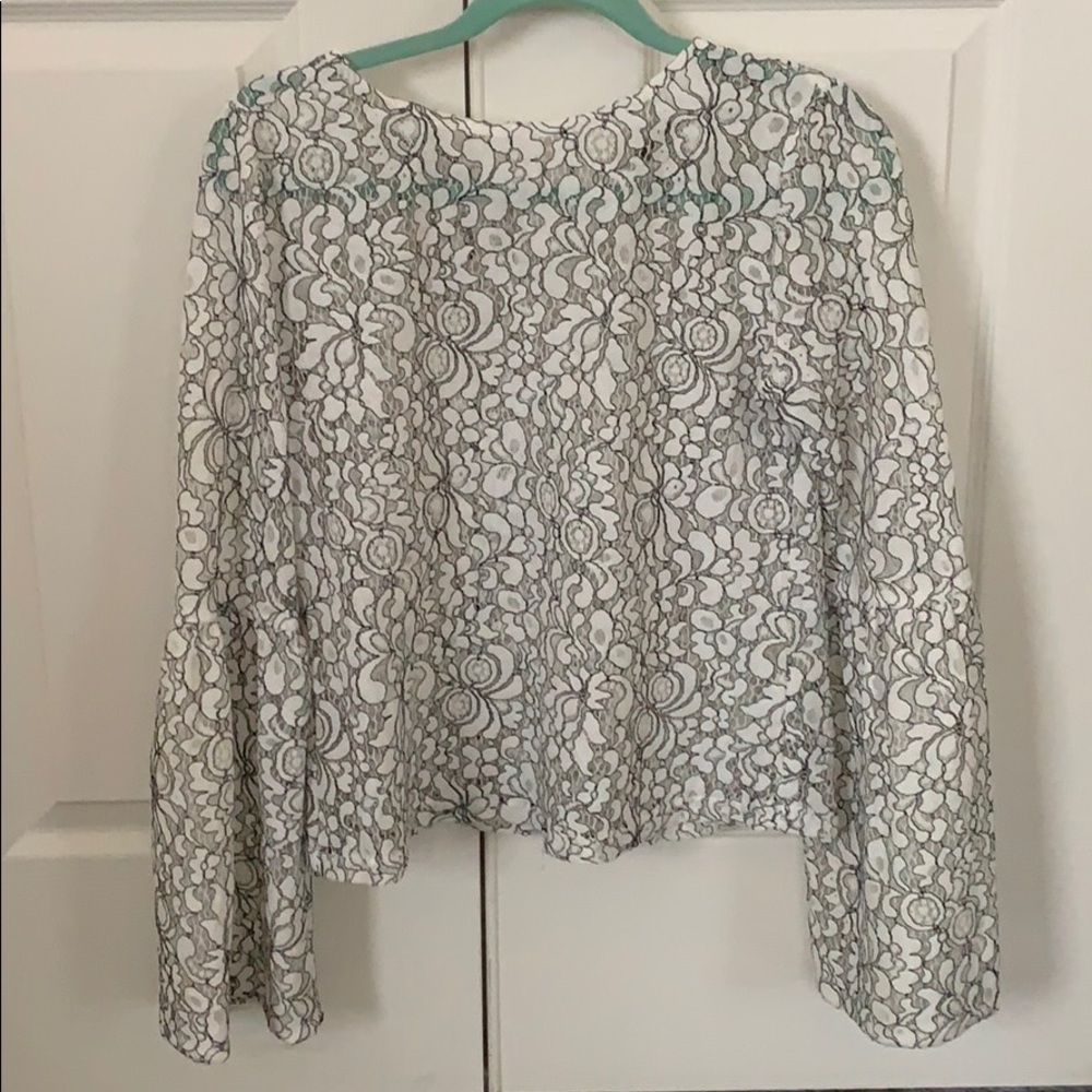 White, with black detail lace long sleeve top